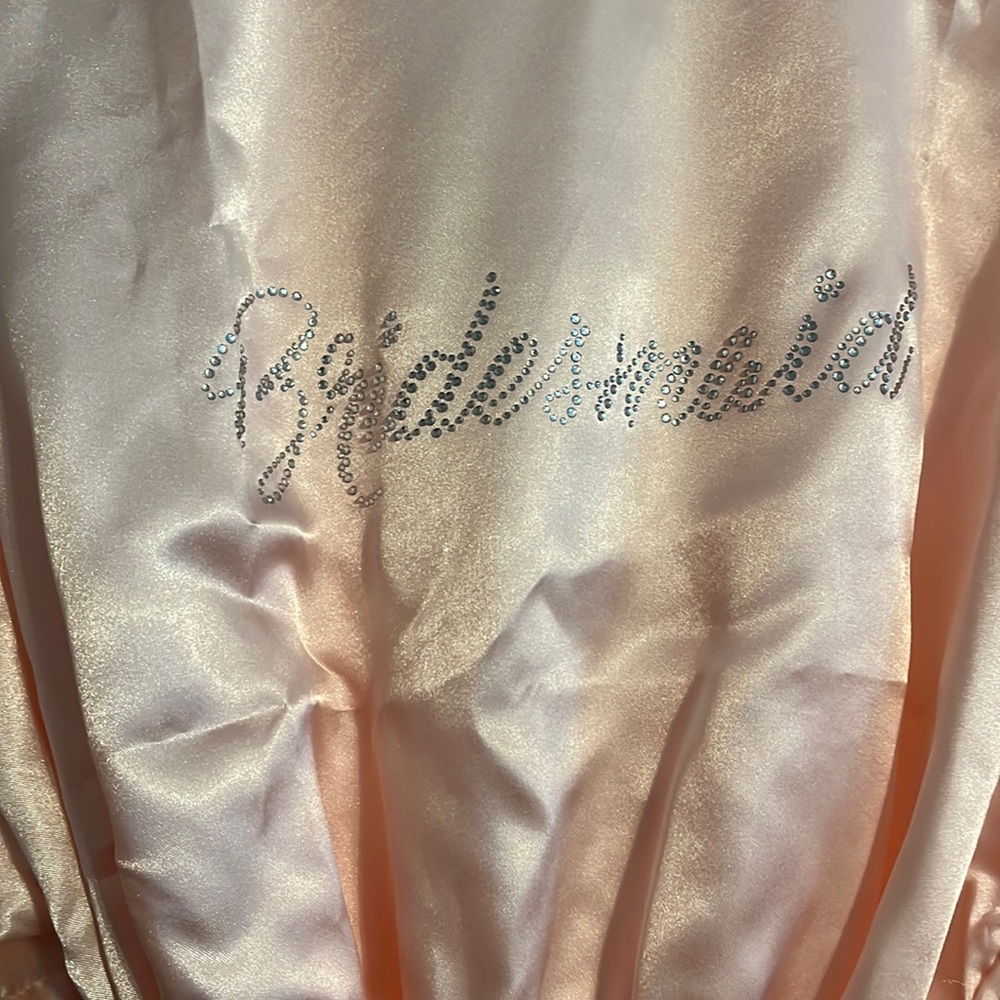 One size pink satin bridesmaid robe. New never used.